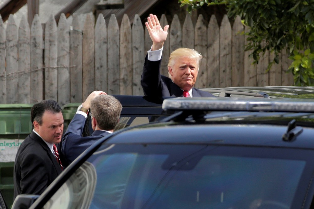 Republican U.S. presidential candidate Donald Trump waves after meeting with House Republican members in Washington, D.C., July 7, 2016. (Photo by Joshua Roberts/Reuters)