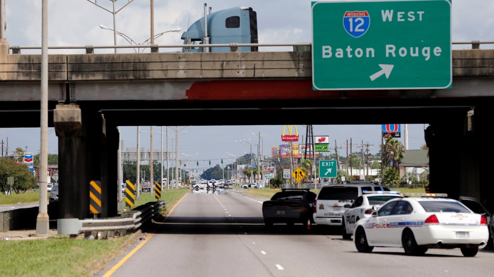 Police officers block off a road after a shooting of police in Baton Rouge, Louisiana, July 17, 2016. (Photo by Joe Penny/Reuters)