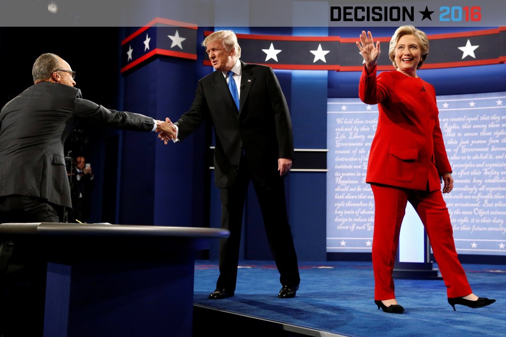 Republican U.S. presidential nominee Donald Trump and Democratic U.S. presidential nominee Hillary Clinton take the stage for their first debate at Hofstra University, Sept. 26, 2016 in Hempstead, N.Y. (Photo by Jonathan Ernst/Reuters)