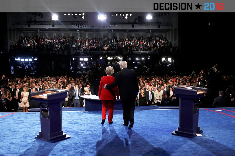 Republican presidential nominee Donald Trump and Democratic presidential nominee Hillary Clinton walk away from their podiums after the presidential debate at Hofstra University in Hempstead, N.Y. on Sept. 26, 2016. (Photo by Joe Raedle/Pool/Reuters)
