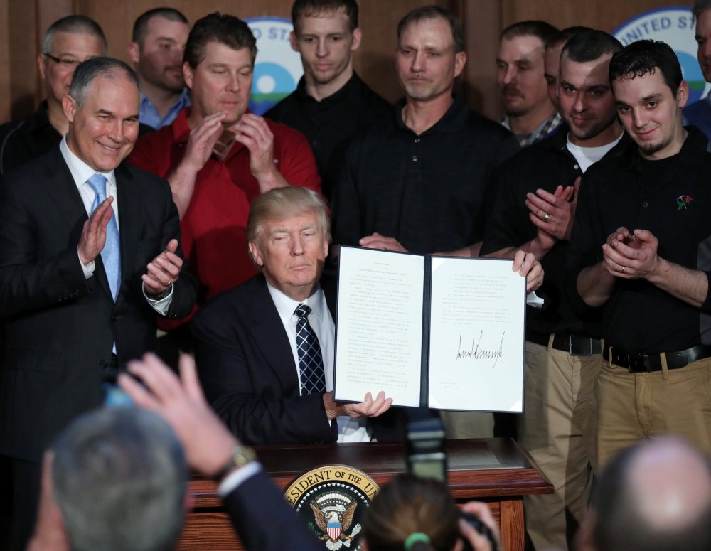 Image: U.S. President Trump displays executive order on "energy independence" during event at EPA headquarters in Washington