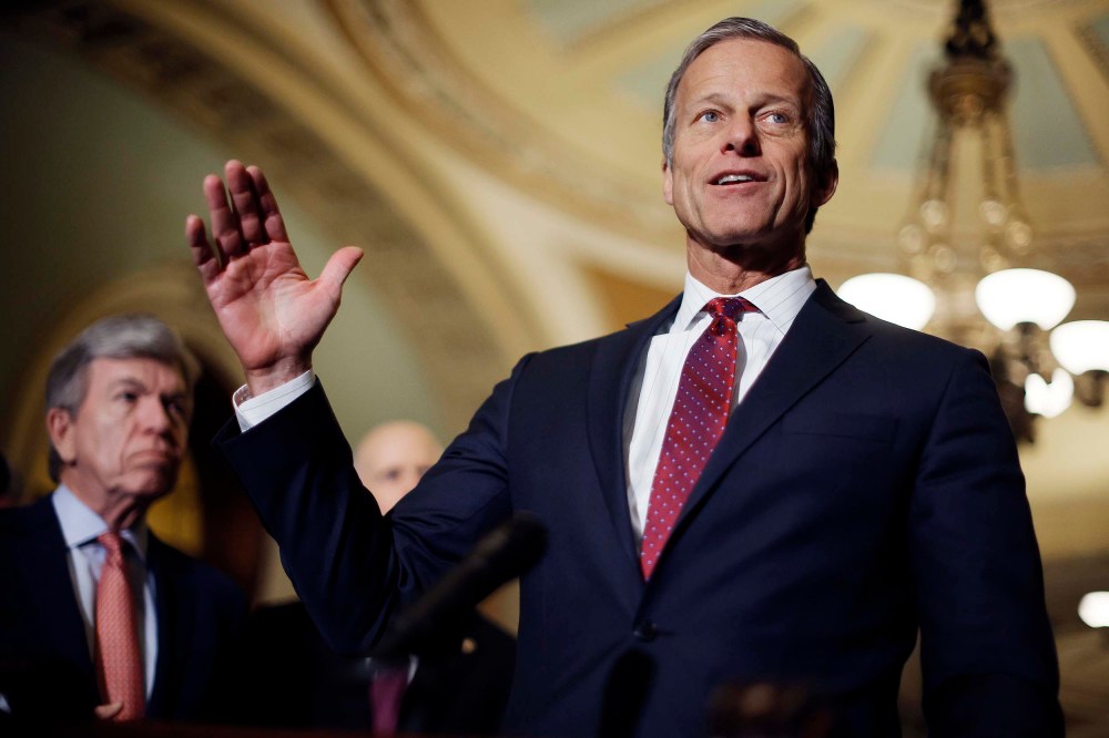Sen. John Thune talks to reporters with Sen. Roy Blunt at the U.S. Capitol on Tuesday, March 29 in Washington, D.C.