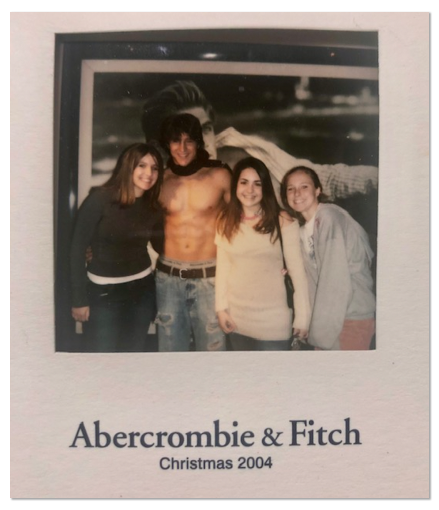 Image: A photo of three girls and a boy. The text on the photo card reads,