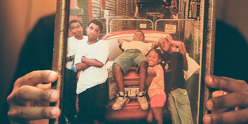 Image: Director Edward Buckles Jr. holding his family photo.