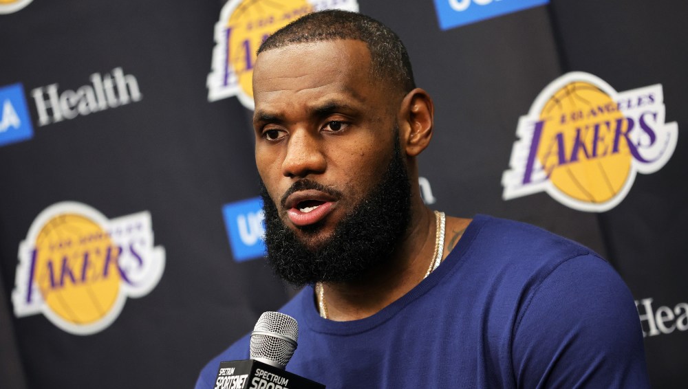 Image:  LeBron James speaks during a news conference.