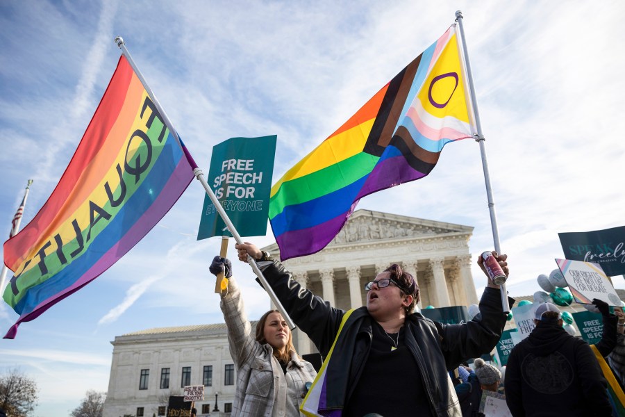 Demonstrators protest outside the Supreme Court before justices hear oral arguments on 303 Creative LLC v. Elenis on Dec. 5, 2022.