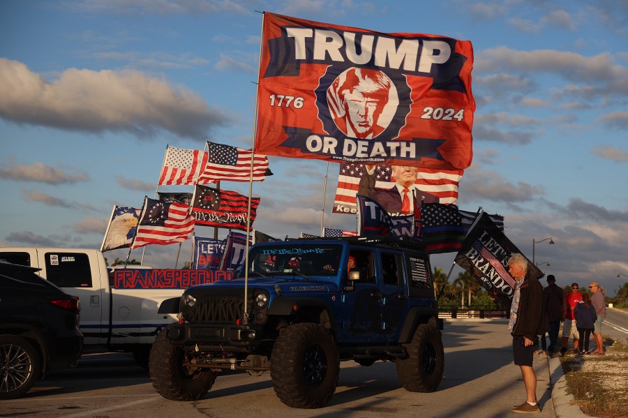 Donald Trump's supporters near his Mar-a-Lago home in Palm Beach, Fla., on March 20, 2023.