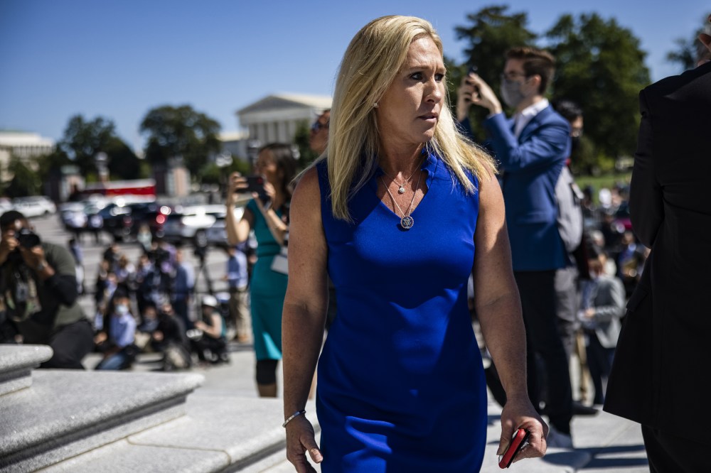 Marjorie Taylor Greene on the steps of the U.S. Capitol before a "Build Back Better For Women" event
