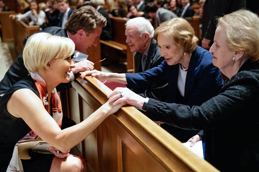 Mika Brzezinski and Joe Scarborough chat with former President Jimmy Carter, his wife Rosalynn Carter and former secretary of state Madeline Albright at Brzezinski's father's funeral in 2017.