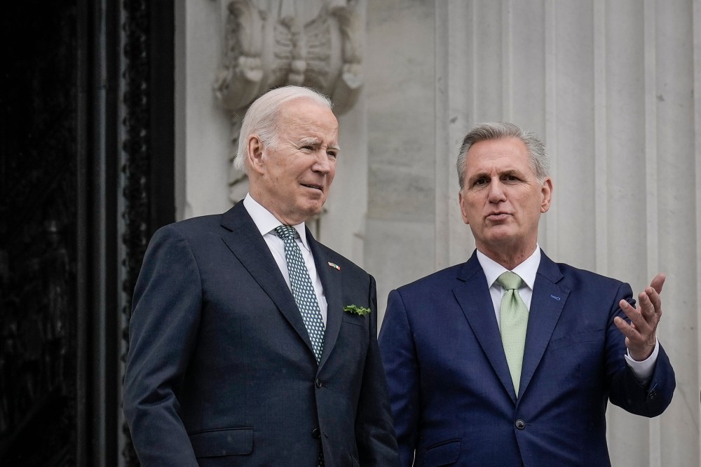 President Joe Biden and Speaker of the House Kevin McCarthy leave the Capitol