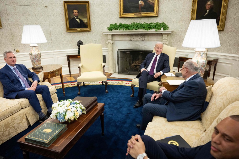 (L to R) Speaker of the House Kevin McCarthy (R-CA), US President Joe Biden, Senate Majority Leader Charles E. Schumer (D-NY), and House Minority Leader Hakeem Jeffries (D-NY) wait before a meeting about the United States's debt ceiling in the Oval Office of the White House May 9, 2023, in Washington, DC. Biden and Republican leaders met in hopes of breaking an impasse over the US debt limit. The lifting of the national debt ceiling allows the government to pay for spending already incurred.