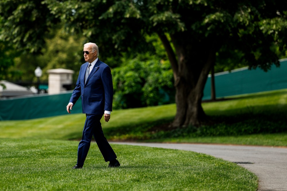 President Joe Biden walks on the South Lawn of the White House on May 10, 2023.