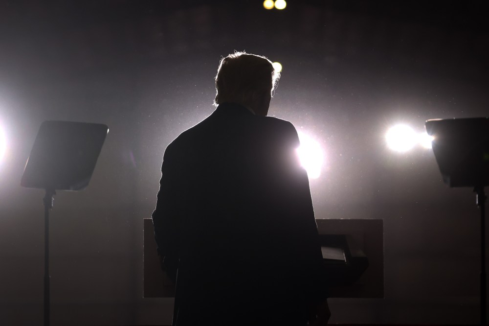 Former President Donald Trump speaks at a rally near Washington, Mich.