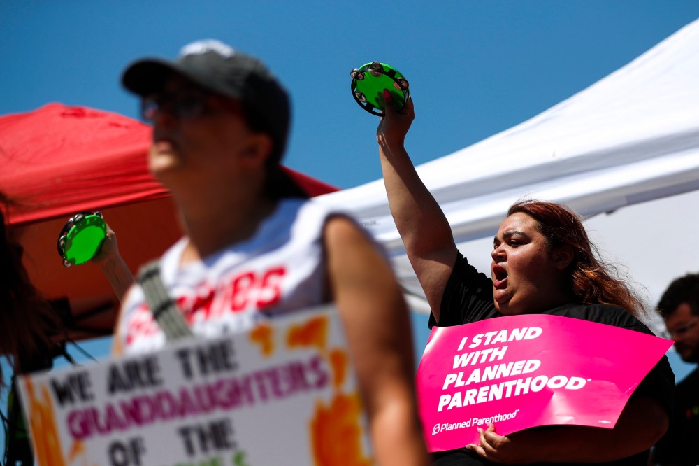 Demonstrators call for reproductive freedom at a rally