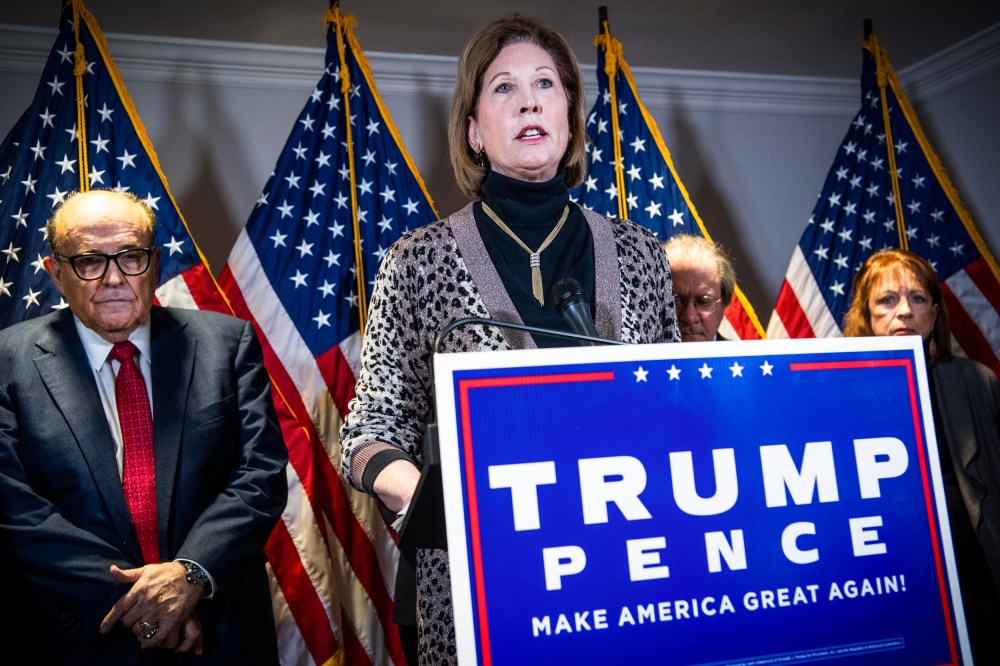 Sidney Powell, attorney for President Donald Trump, alongside attorney Rudolph Giuliani, left, conducts a news conference at the Republican National Committee on lawsuits regarding the outcome of the 2020 presidential election on Nov. 19, 2020.