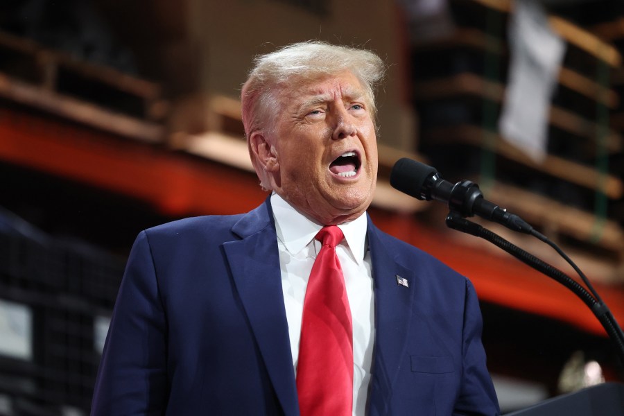 Former President Donald Trump speaks in Clinton Township, Mich.