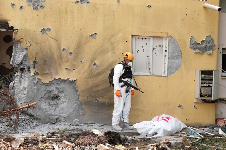 soldier gun holes body hamas militant weapon