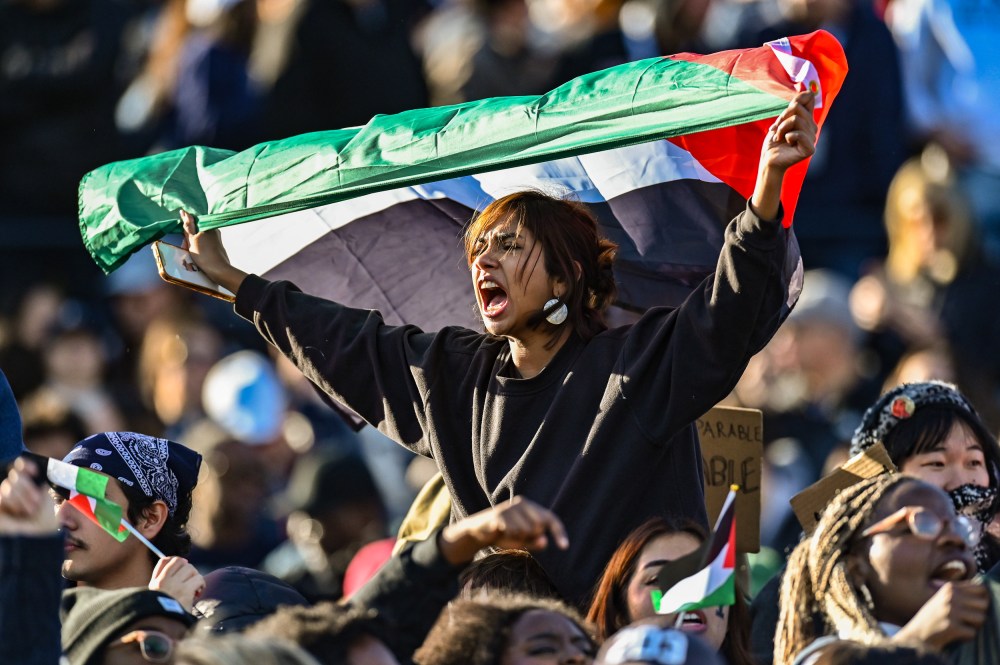 Yale Bulldogs students protest for Palestine during the game as the Harvard Crimson take on the Yale Bulldogs