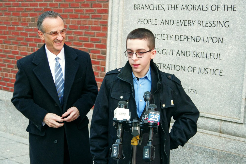 Middle schooler Liam Morrison speaks outside of the U.S. Court of Appeals for the First Circuit in Boston on Thursday morning, Feb. 8, 2024. His attorney, David Cortman, looks on.