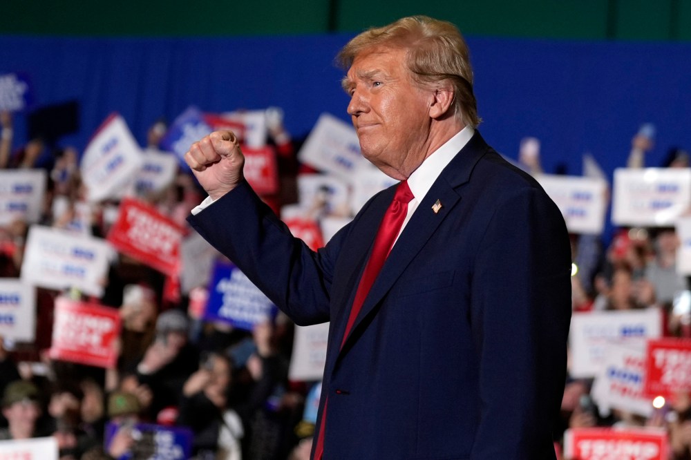 Donald Trump arrives at a campaign rally in Greensboro, N.C.