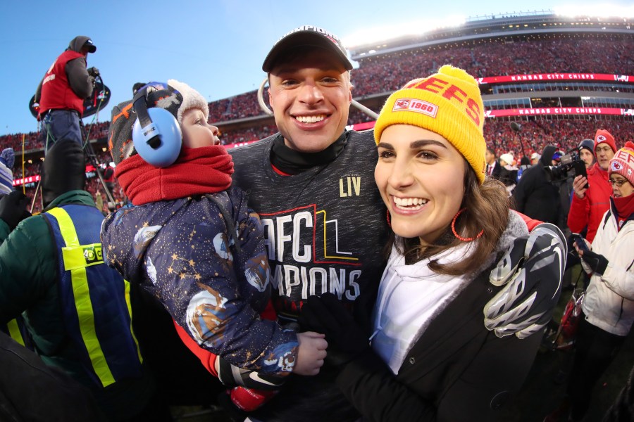 Harrison Butker of the Kansas City Chiefs celebrates on the field after defeating the Tennessee Titans in the AFC Championship Game at Arrowhead Stadium on Jan. 19, 2020.