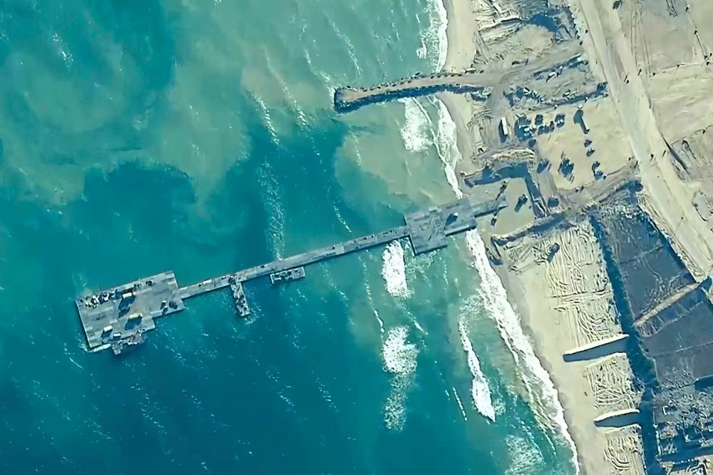 The temporary pier is part of the Joint Logistics Over-the-Shore capability. The U.S. military finished installing the floating pier on Thursday, with officials poised to begin ferrying badly needed humanitarian aid into the enclave besieged over seven months of intense fighting in the Israel-Hamas war.