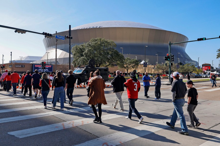 Fans walk towards the Caesars Superdome ahead of the Sugar Bowl on Thursday, Jan. 2, 2025, in New Orleans. 