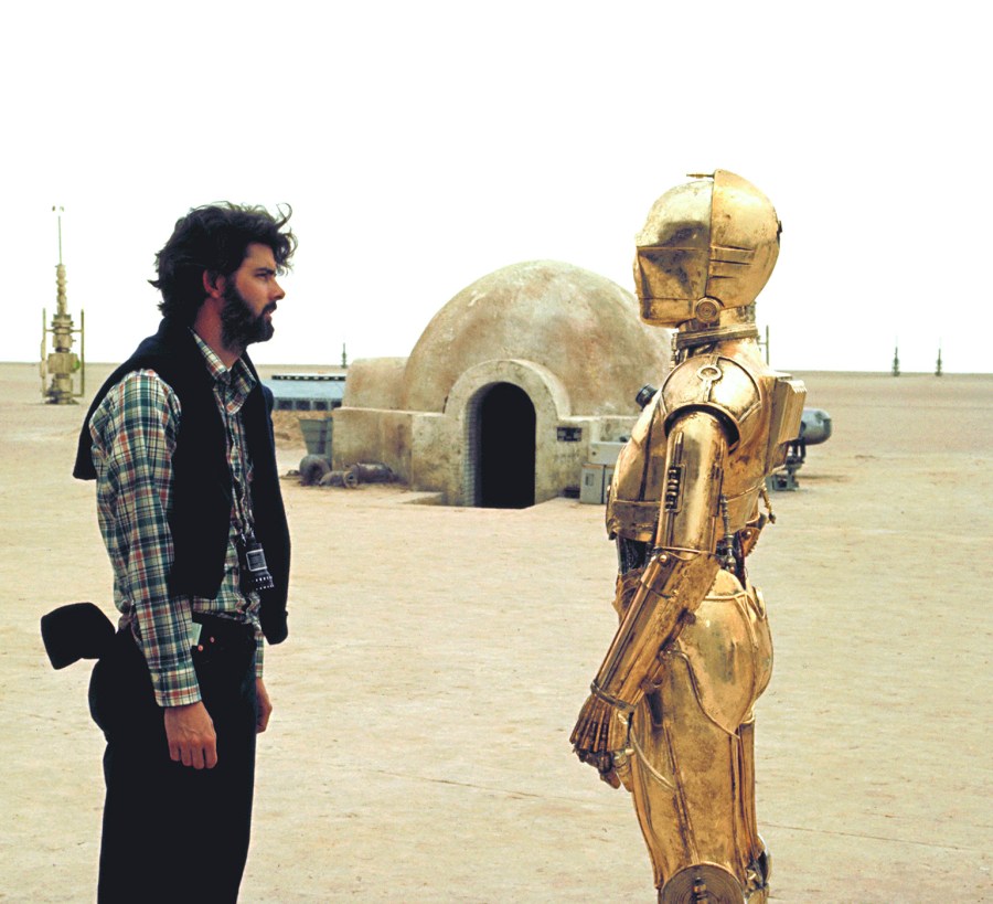 On the set of Star Wars: Episode IV, George Lucas and Anthony Daniels who plays C-3PO. (Photo courtesy of Lucasfilm/Corbis)