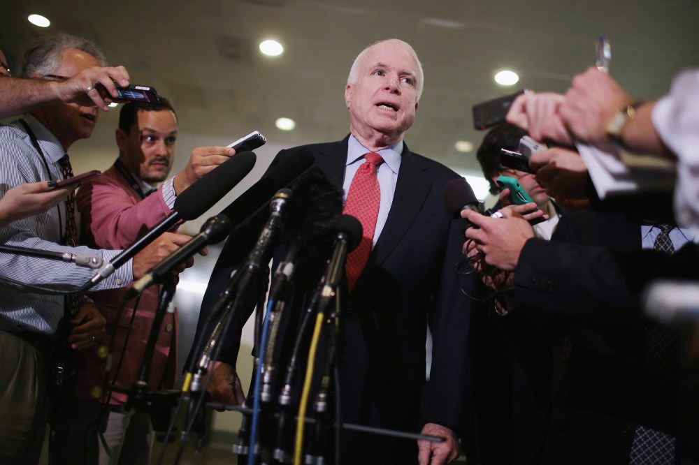 U.S. Sen. John McCain (R-Ariz.) talks with reporters at the U.S. Capitol June 10, 2014 in Washington, D.C. Armed Services On Bowe Bergdahl Release