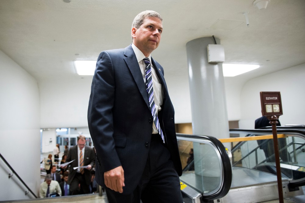 Sen. Mark Begich, D-Alaska, arrives in the Capitol for a vote on June 17, 2014, in Washington, D.C.