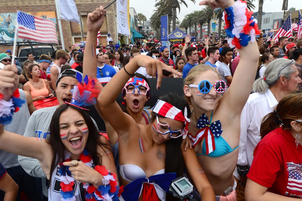 US fans gather to watch on a big screen at Hermosa Beach, California on June 26, 2014.