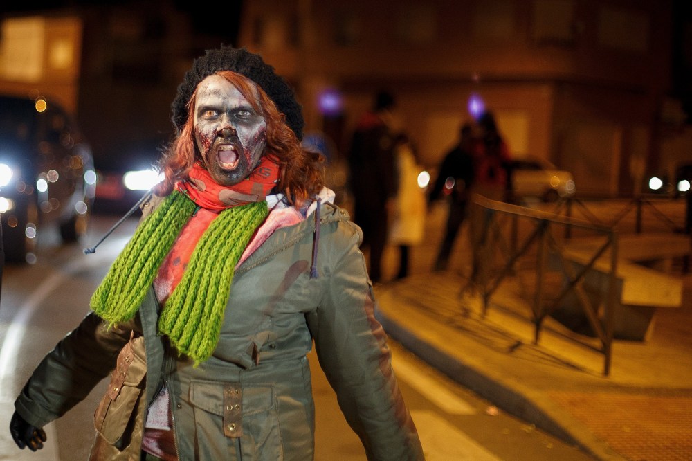 A zombie walks the streets during Zombie Survival contest on December 1, 2013 in Alameda de la Sagra, near Toledo, Spain.