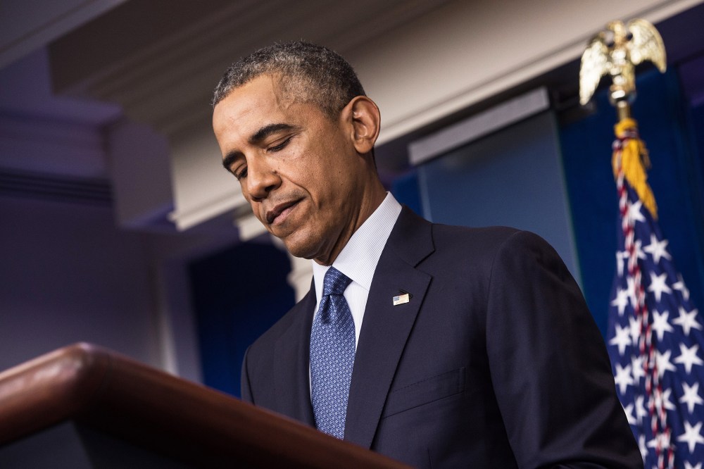 President Barack Obama pauses as he makes a statement in the briefing room of the White House on Aug. 1, 2014 in Washington, D.C.
