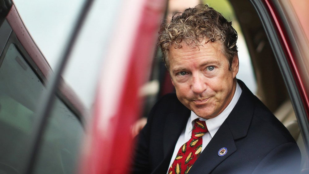U.S. Sen. Rand Paul (R-KY) is questioned by a reporter as he leaves an event at the Iowa GOP Des Moines Victory Office on August 6, 2014 in Urbandale, Iowa.