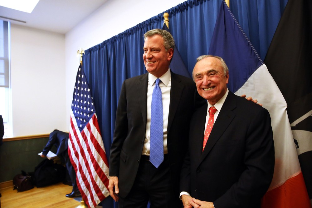 Incoming New York mayor Bill de Blasio stands with Bill Bratton, who has been named to lead the NYPD, Dec. 5, 2013.