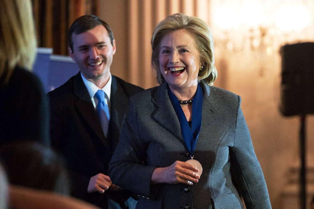Hillary Clinton smiles after receiving the 2013 Lantos Human Rights Prize, Dec. 6, 2013.