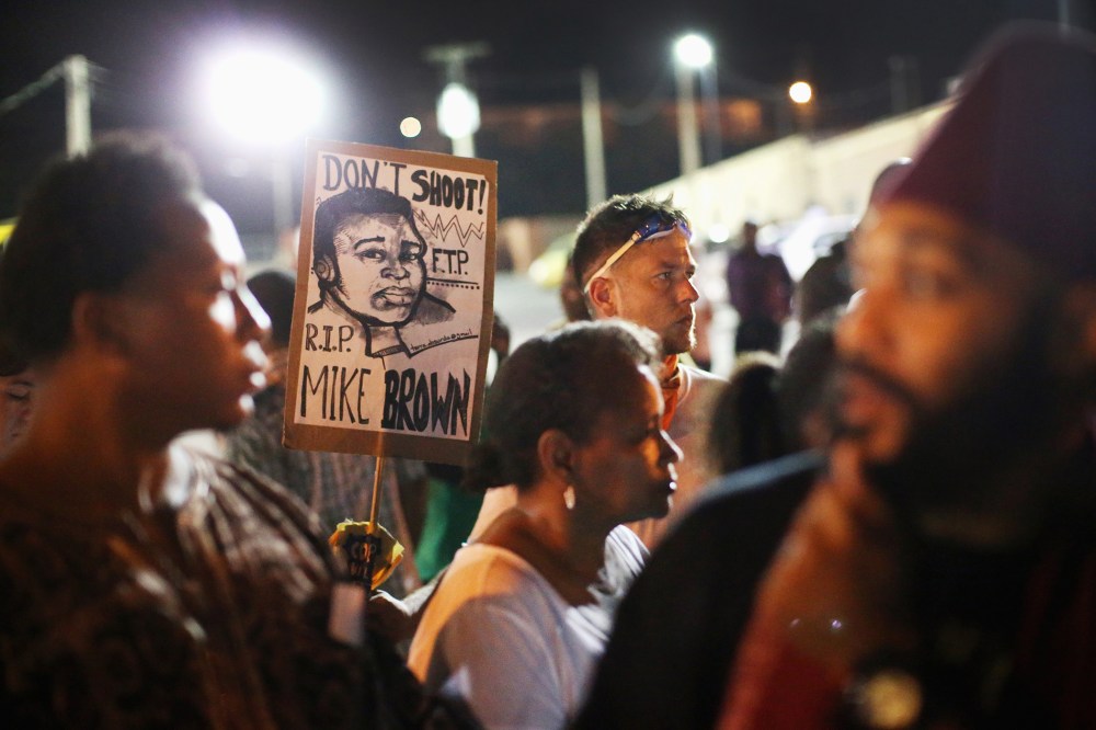 Demonstrators protest the shooting death of Michael Brown on Aug. 23, 2014 in Ferguson, Mo.