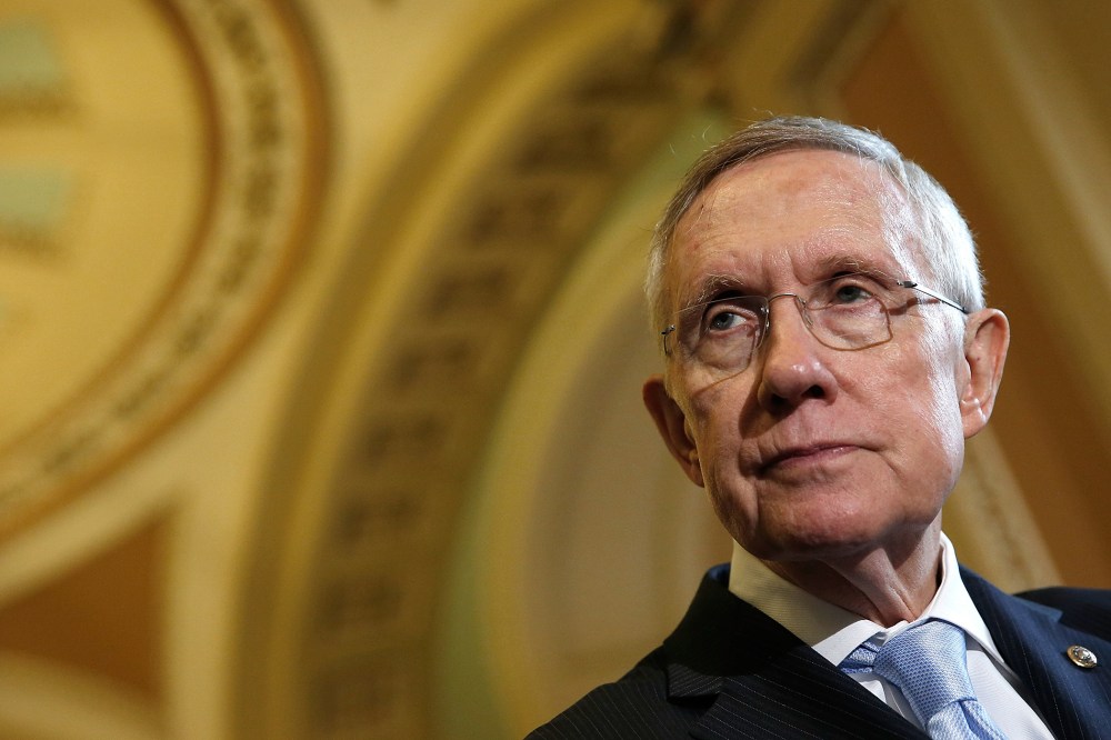 Senate Majority Leader Harry Reid answers questions following the weekly Democratic policy luncheon at the U.S. Capitol on Sept. 16, 2014 in Washington, DC. (Win McNamee/Getty)