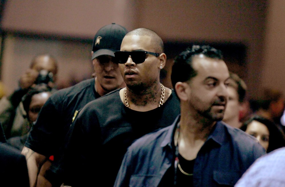 Recording artist Chris Brown (C) attends the 2014 iHeartRadio Music Festival at the MGM Grand Garden Arena on Sept. 19, 2014 in Las Vegas, Nevada.