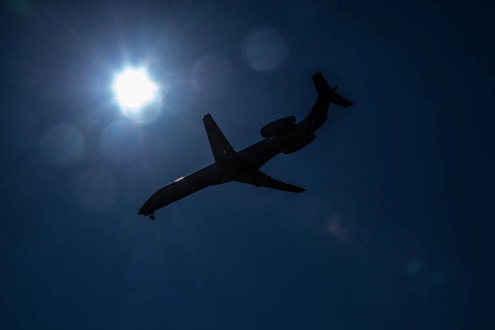 A plane comes in to land. (Photo by Nicholas Kamm/AFP/Getty)