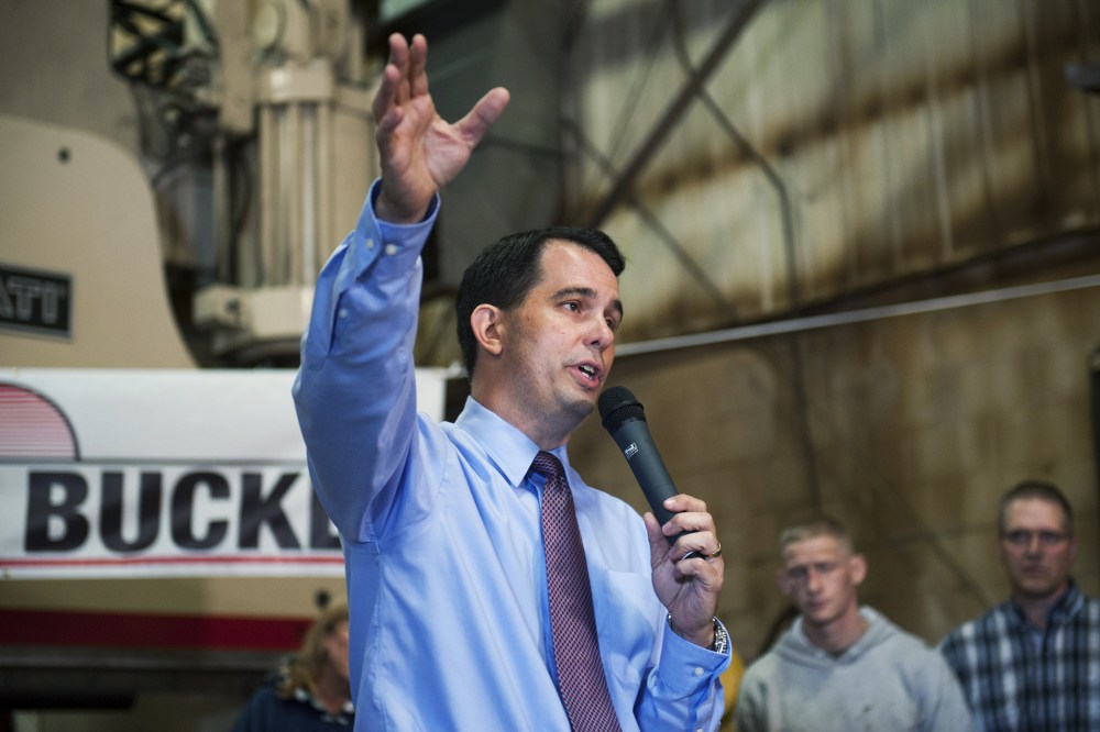 Wisconsin Gov. Scott Walker speaks at Empire Bucket, a manufacturing facility September 29, 2014 in Hudson, Wisconsin.