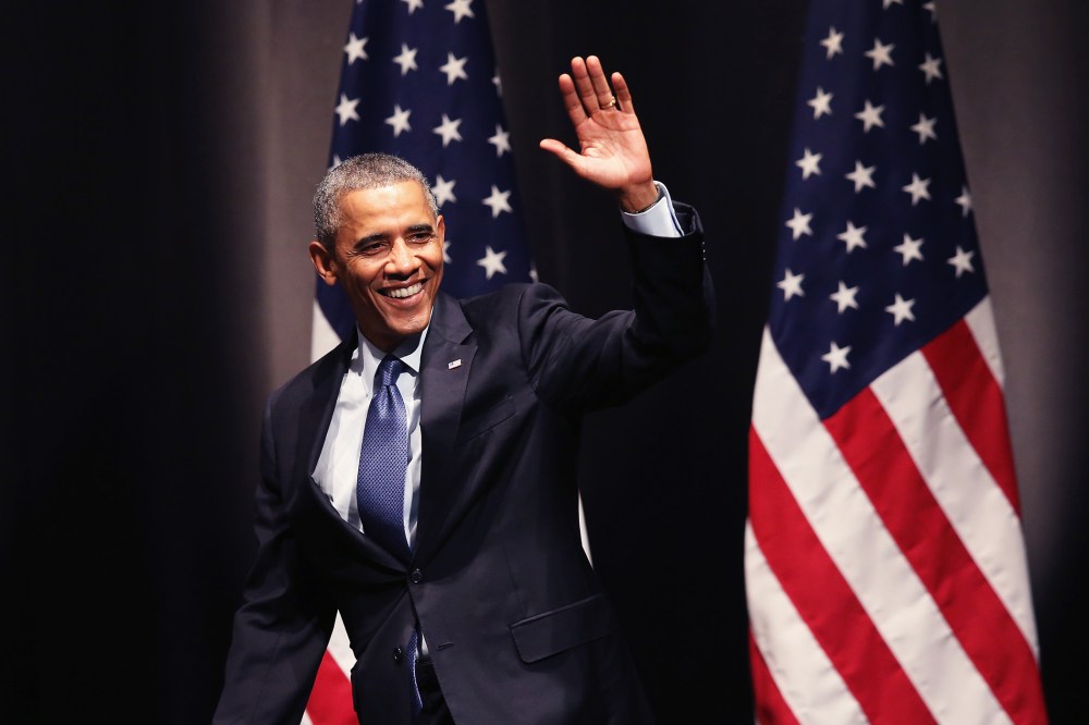 President Barack Obama waves to guests as he arrives for a speech on Oct. 2, 2014 in Evanston, Illinois. (Photo by Scott Olson/Getty)
