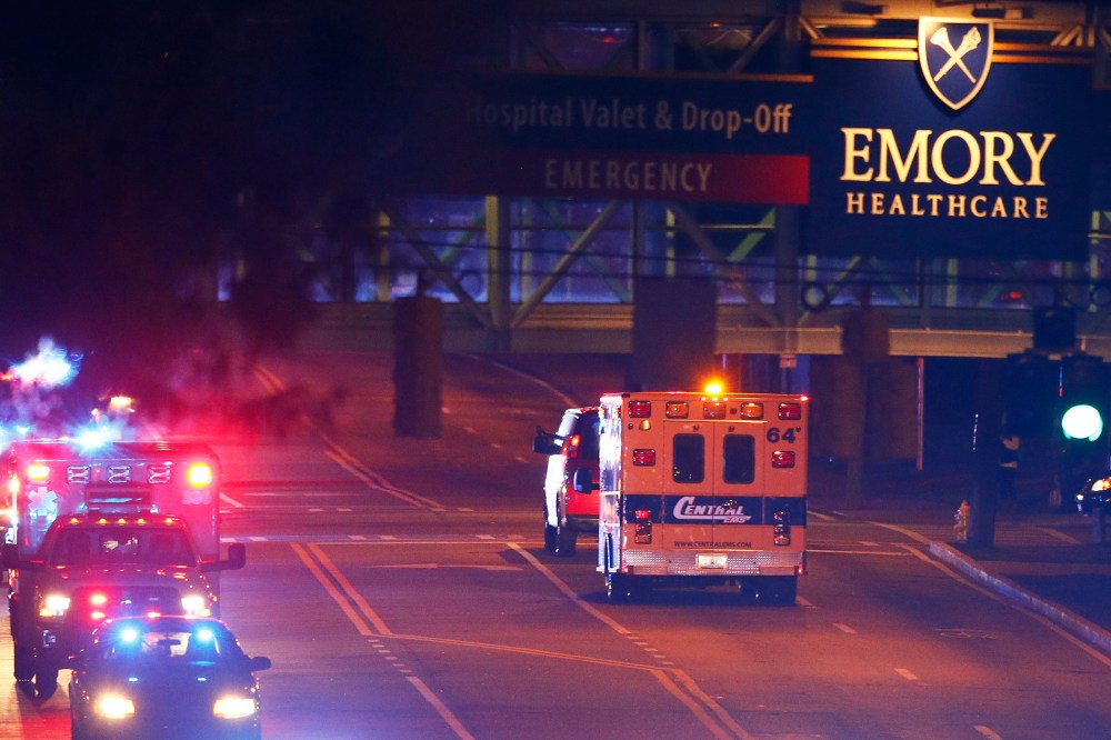 Ebola patient Amber Vinson arrives by ambulance at Emory University Hospital on Oct. 15, 2014 in Atlanta, Ga. (Photo by Kevin C. Cox/Getty)