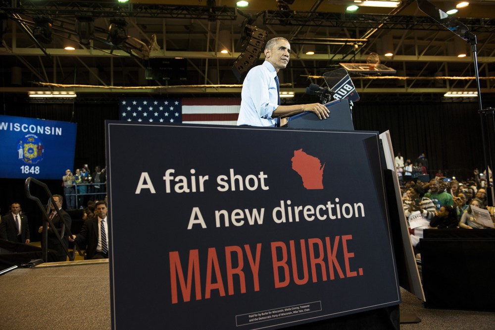 US President Barack Obama speaks during a rally at North Division High School Oct. 28, 2014 in Milwaukee, Wisconsin. (Photo by Brendan Smialowski/AFP/Getty)