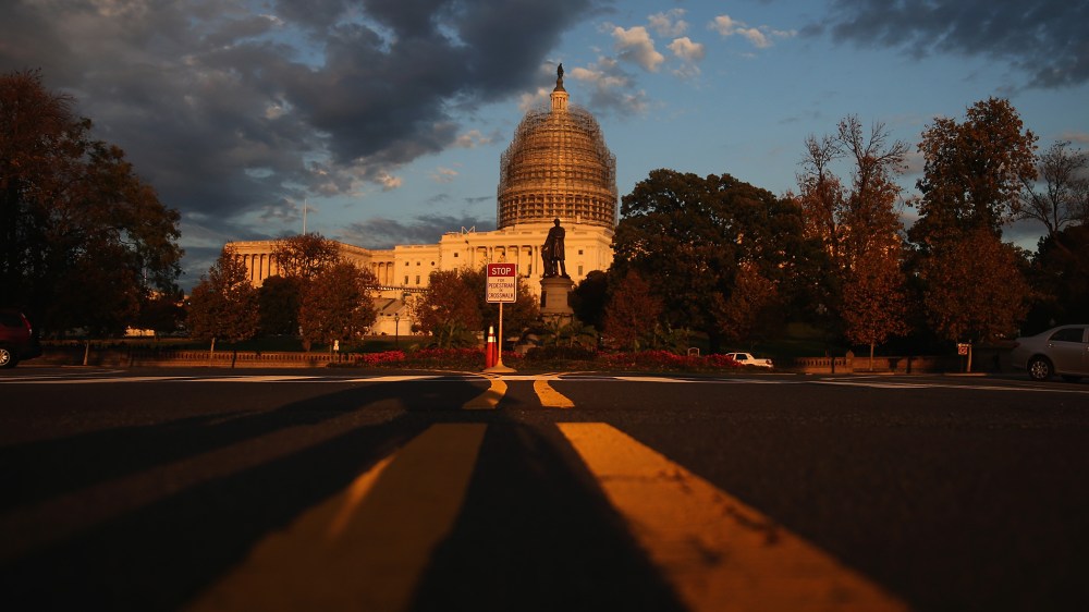 The afternoon sun hits the U.S. Capitol on the eve of the nation's mid-term elections, Nov. 3, 2014 in Washington, D.C. (Photo by Mark Wilson/Getty)