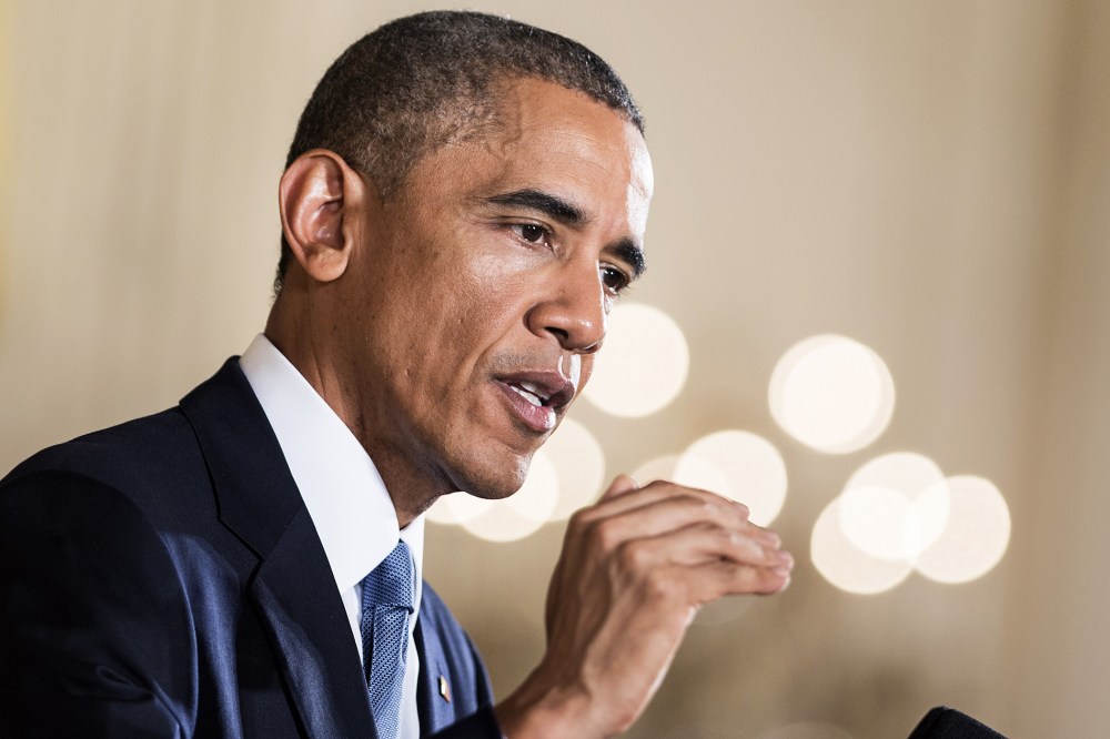 President Barack Obama pauses while speaking during a press conference in the East Room of the White House on Nov. 5, 2014 in Washington, D.C. (Photo by Brendan Smialowski/AFP/Getty)