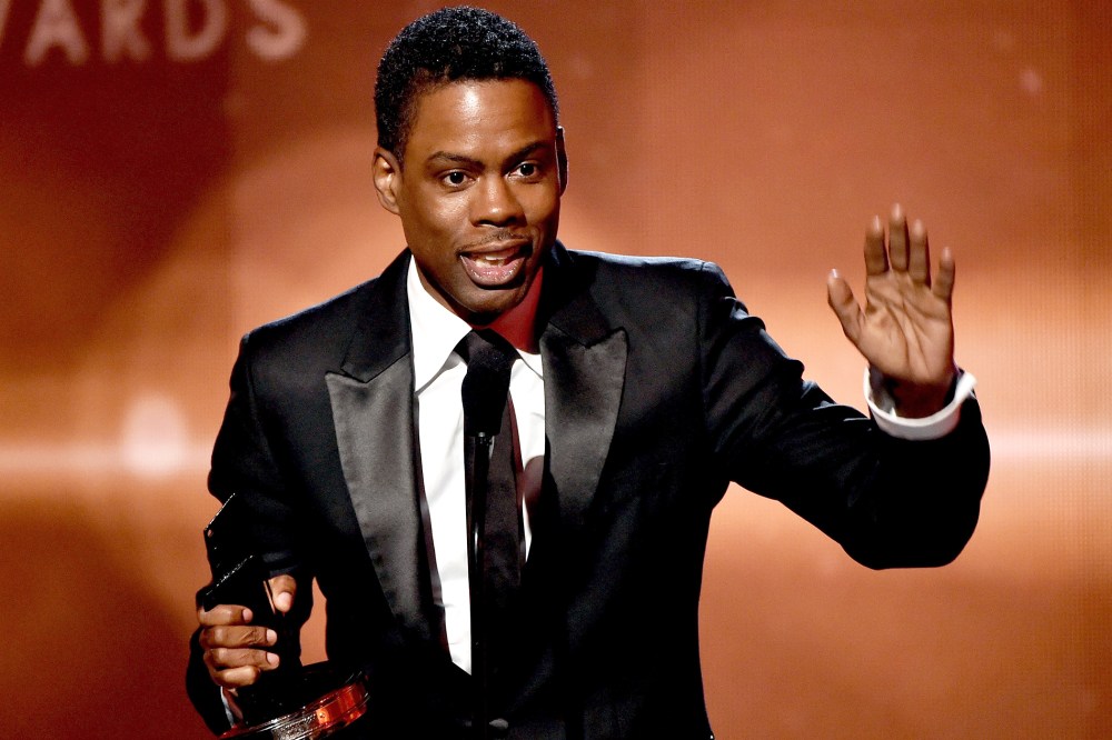 Actor-comedian Chris Rock accepts the Hollywood Comedy Film Award for 'Top Five' onstage during the 18th Annual Hollywood Film Awards on Nov. 14, 2014 in Hollywood, Calif. (Photo by Kevin Winter/Getty)