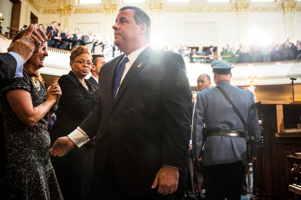 New Jersey Governor Chris Christie shakes hands with audience members before the annual State of the State address on Jan. 13, 2015 in Trenton, N.J. (Photo by Andrew Burton/Getty)