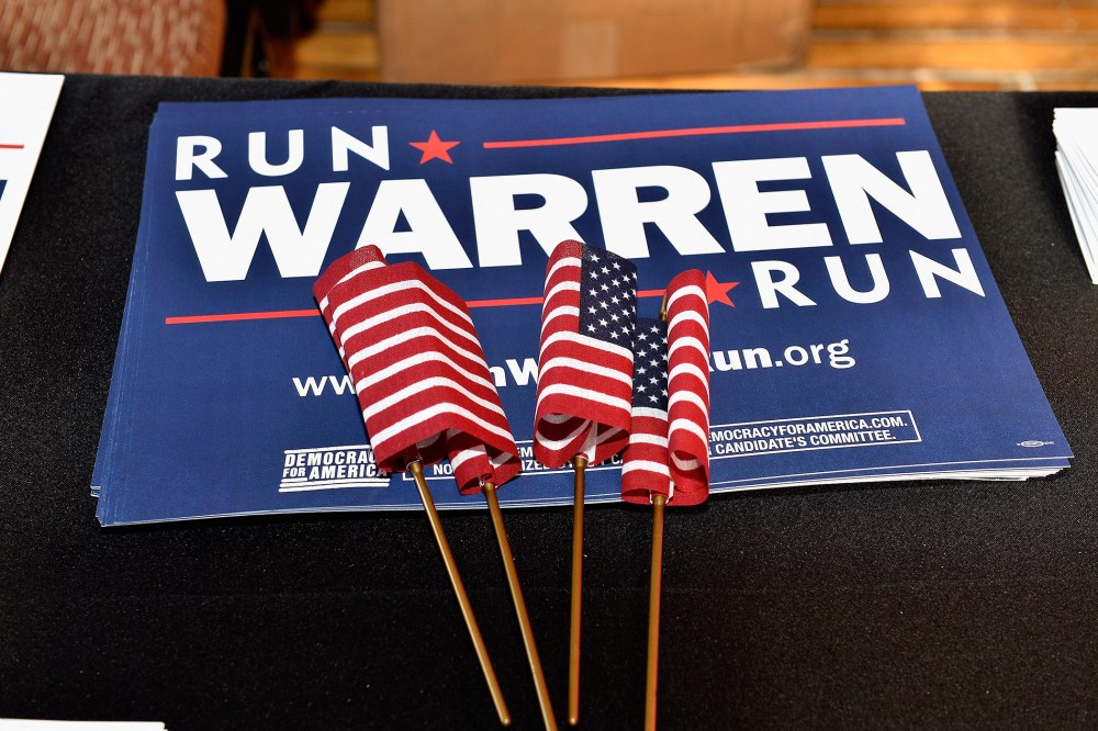Signs and flags a "Run Warren Run" event on Jan. 17, 2015 in Manchester, N.H.