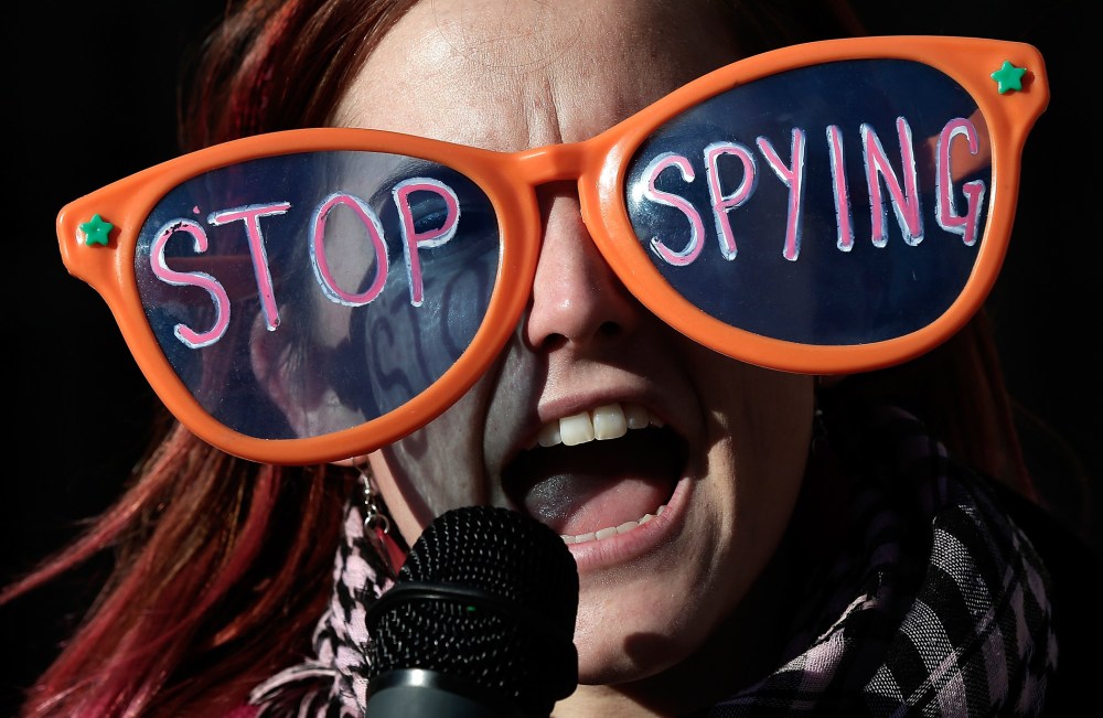 Alli McCracken joins activists protesting the surveillance of U.S. citizens by the NSA outside the Justice Department, January 17, 2014 in Washington, D.C.
